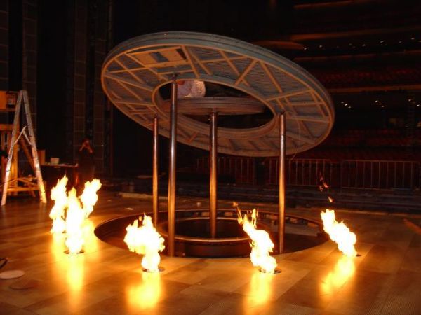Ring Cycle 2004 - Scenic Floor Panels
Perforated mesh look flooring with ring lift and some of the flame jets in operation
